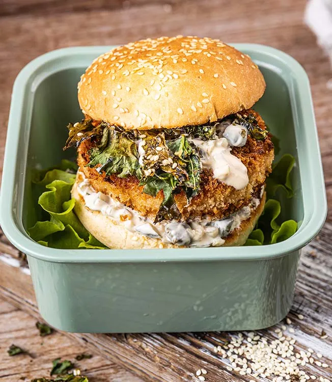 Fish burger with kale and yoghurt sauce