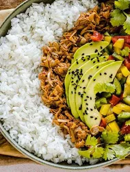 Teriyaki pulled jackfruit & rice bowl with avocado, and pepper salsa