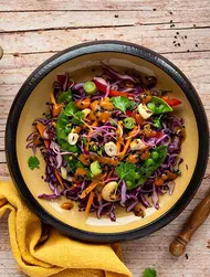 Red cabbage salad with cashews & snow peas
