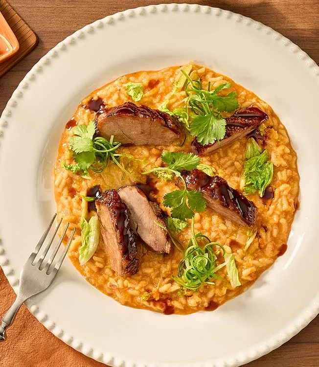 Kimchi risotto with crispy goose breast