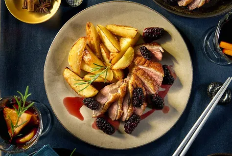 Duck breast with blackberry sauce & miso potatoes