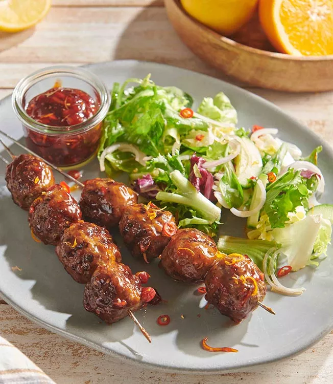 Grilled meatballs with soy sauce and cranberry glaze