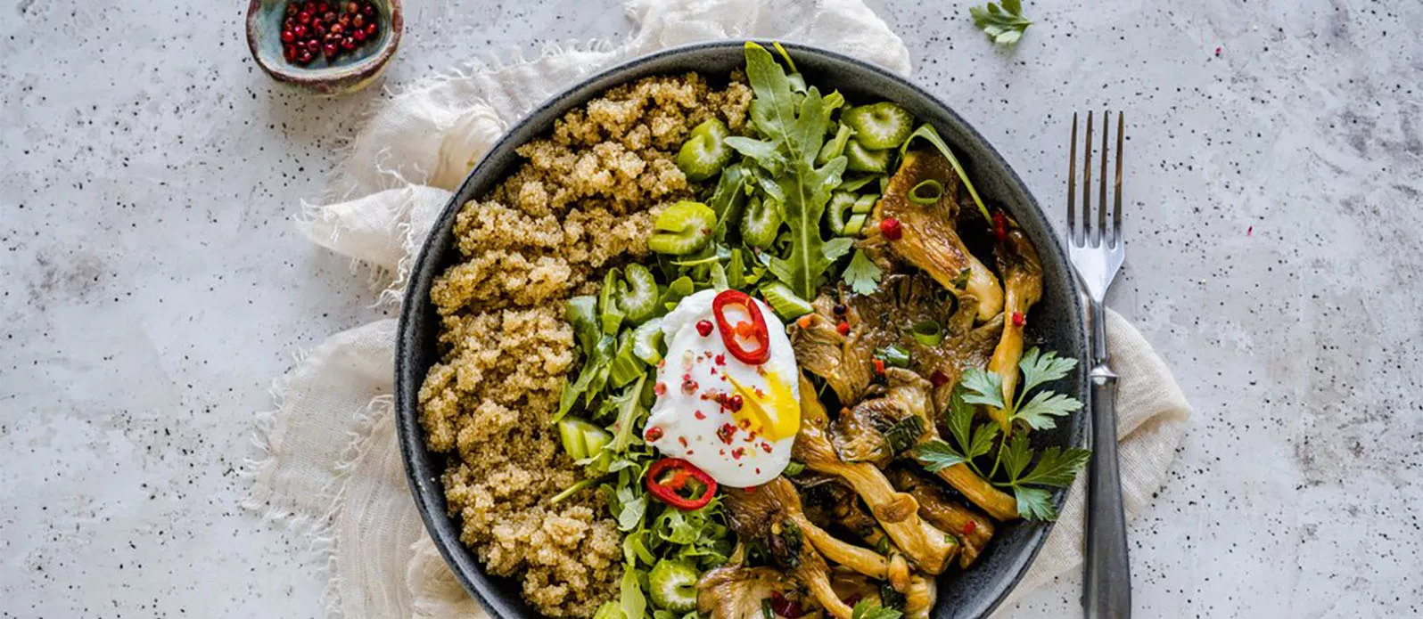 Amaranth bowl with oyster mushrooms and poached egg