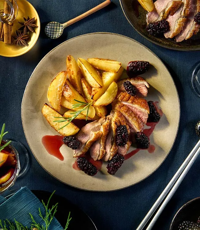 Duck breast with blackberry sauce & miso potatoes