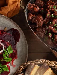 Tangy-sweet chicken livers with beetroot salad and peanuts