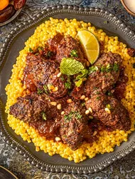 Beef kofta in rich tomato-soy sauce
