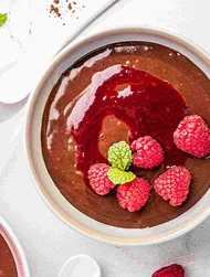 Chocolate rice pudding with raspberry sauce