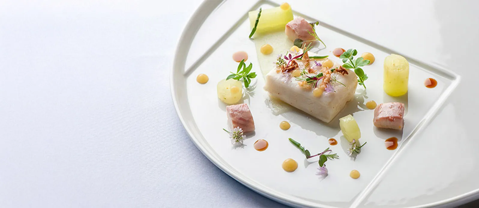 Soy and butter poached halibut, pickled apple, smoked eel