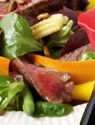 Rib-eye beef salad with Kikkoman toasted sunflower seeds