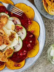 Mozzarella and persimmon carpaccio with turkey fillet