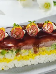 Sushi cake with roast beef and avocado