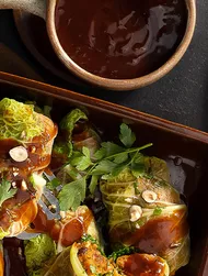 Savoy cabbage wrap with sweet potatoes, mushrooms and cinnamon jus