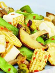 Vegan tofu, snow peas and pistachio salad