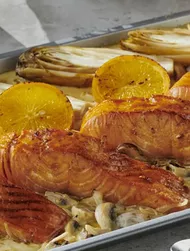 Salmon fillet in orange sauce with mushroom cream sauce