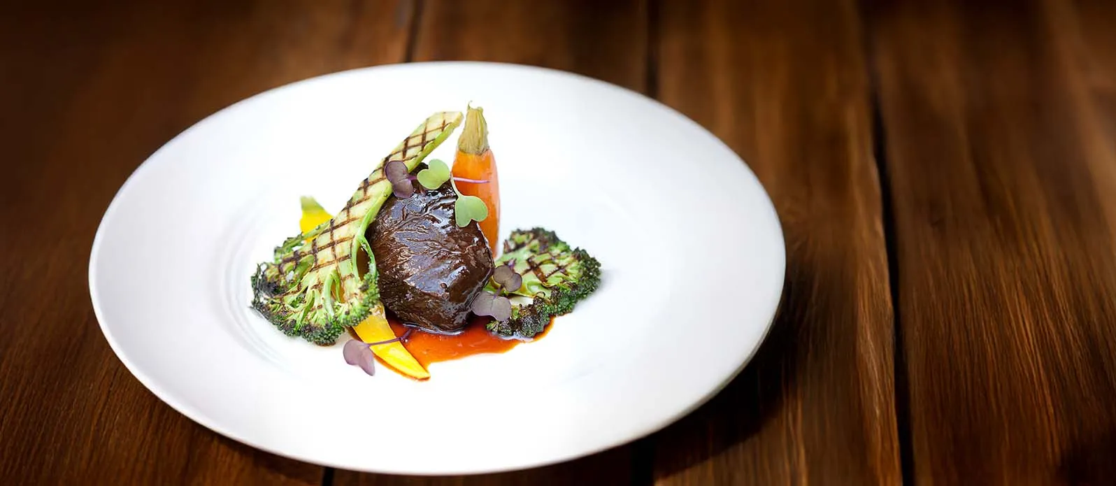 Soy braised beef cheek with grilled broccoli and heritage carrots