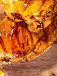 Sticky BBQ chicken breast in orange, chilli, honey and soy marinade