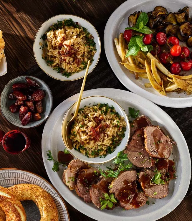 Slow-roasted lamb leg with orzo pilaf