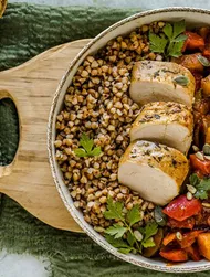 Savoury buckwheat bowl with roasted pork & paprika pepper sauce